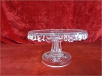 Vintage round glass pedestal cake plate.