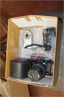 box of cameras. Minolta, Ricok, DXG.