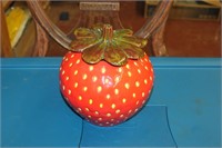 Strawberry Cookie Jar. Chipped on top. very pretty