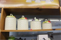canister set. Basket weave look w/ flower tops