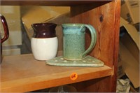 Green pottery mug and Brown/white pottery pitcher