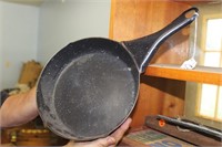 Stoneware black skillet with white speckle pattern