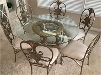 Glass top table and 6 metal chairs