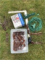 Assorted extension cords and air pump