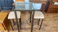 Glass top metal cocktail table w/ (2) upholstered