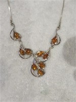 BEAUTIFUL ORNATE STERLING SILVER AND AMBER