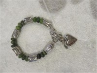 ORNATE BRACELET WITH GREEN NATURAL STONE BEADS