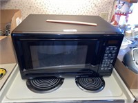 GE Sensor countertop microwave oven.