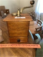 Appears to be antique wooden coffee bean mill.