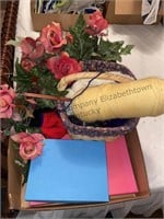 Yarn, empty boxes & floral arrangement