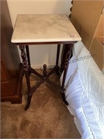 2 matching Wood table with marble top. 28 x 14 sq.