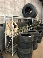 18’ dual tier tire rack w/ (9) misc cat/truck