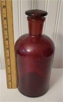 Red Pyrex bottle with stopper