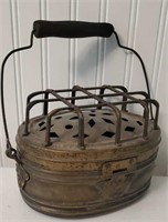 Early brass foot warmer with bale handle