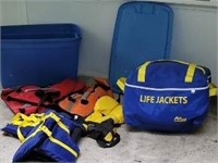 Lot of life jackets, bag has 4, tub has 5,