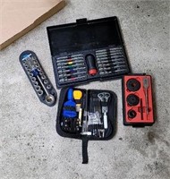 Hole saw kit, screwdriver set, park tool.
