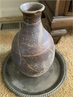 Pottery vase and metal plate