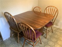 47”x47” kitchen table with 4 chairs, and 1 leaf,