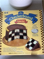 Old fashioned checkered cake set and tin