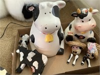 2 cow cookie jars and cow decor