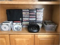 ONN CD Player , Carrying Case and Assortment of