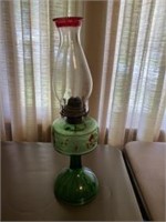 Green and red kerosene lamp