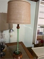 Glass bottle table lamp.  Measures 23 inches to