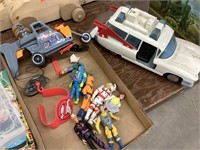 Ghostbuster car, figures, and helicopter car.