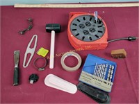 Extension cord, drill bits, mallet door stop,