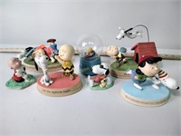 Peanuts figurines and snow globe