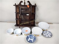 Set of 6 nesting bowls with lids, wall shelf