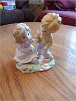 Boy and girl figurine