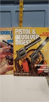 2 softcover books on guns