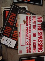 3 metal no trespassing signs, 2 plastic