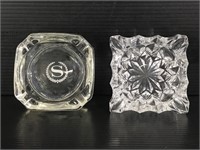 Two glass ashtrays