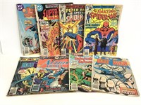 Eight vintage superhero comics