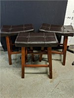 Three solid wooden and Upholstered bar stools 10"