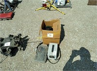 battery charger, box of grinding wheels, sod gun