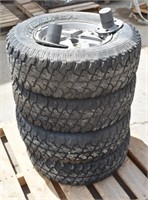 Cooper 4 - 235/75R15 Tires on Ford Rims, Loc: *C