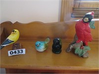 4 bird figurines
