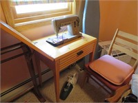 singer sewing machine / cabinet / chair