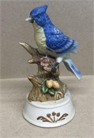 Musical blue bird figurine