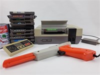 Console Nintendo, manette/pistolet & jeux