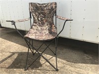 Huge Ducks Unlimited camo folding lawn chair.