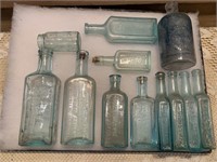 LOT OF 12 ANTIQUE BLUE APOTHECARY BOTTLES