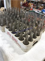 4 PLASTIC POP CRATES W/GLASS POP BOTTLES