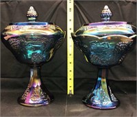 2 blue carnival glass stemmed bowls with lids