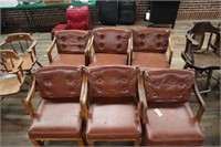 Six Padded Arm Chairs with casters