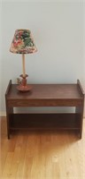 Small shelf with table lamp