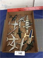11 assorted miniature airplanes